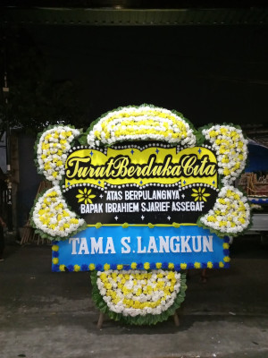 Papan Bunga Duka di Benda